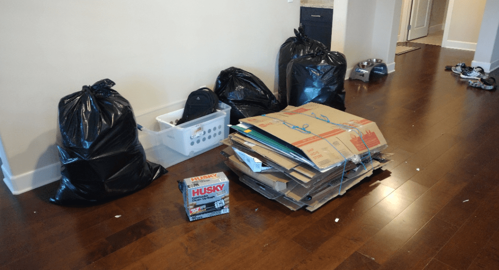 A pile of boxes and trashbags